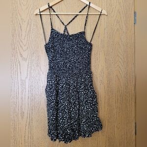 Angie black w/white speckled spaghetti strap smocked ruffle hem shorts romper M